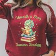 Women's Unearth a Story Triceratops Dinosaur Reading Books Cute Dino Raglan Sleeve Sweatshirt Heather Dust