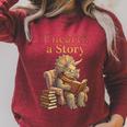 Women's Unearth a Story Triceratops Dinosaur Reading Books Dino Raglan Sleeve Sweatshirt Heather Dust