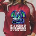 In a World Of Bookworms Be a Book Dragon Reading Raglan Sleeve Sweatshirt Heather Dust In a World Of Bookworms Be a Book Dragon Reading Raglan Sleeve Sweatshirt Heather Dust