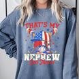 That's My Nephew Out There Baseball Cream Drip Crossed Bat Comfort Colors Sweatshirt Denim That's My Nephew Out There Baseball Cream Drip Crossed Bat Comfort Colors Sweatshirt Denim