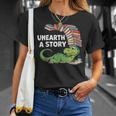 Summer Reading 2026 Unearth a Story Theme Dinosaur Book Nerd T-Shirt Gifts for Her Summer Reading 2026 Unearth a Story Theme Dinosaur Book Nerd T-Shirt Gifts for Her