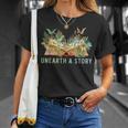 Unearth a Story Dinosaur 2026 Summer Reading Program Book T-Shirt Gifts for Her Unearth a Story Dinosaur 2026 Summer Reading Program Book T-Shirt Gifts for Her