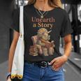 Women's Unearth a Story Triceratops Dinosaur Reading Books Dino T-Shirt Gifts for Her Women's Unearth a Story Triceratops Dinosaur Reading Books Dino T-Shirt Gifts for Her