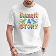 Summer Reading Unearth A Story Dinosaur Books 2026 T-Shirt Unique Gifts Summer Reading Unearth A Story Dinosaur Books 2026 T-Shirt Unique Gifts