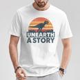 Unearth A Story Dinosaur Reader Book Lover 2026 T-Shirt Unique Gifts
