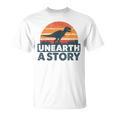 Unearth A Story Dinosaur Reader Book Lover 2026 T-Shirt