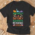 Women's Unearth A Story Summer Reading Program 2026 Dinosaur Book T-Shirt Gifts for Old Men Women's Unearth A Story Summer Reading Program 2026 Dinosaur Book T-Shirt Gifts for Old Men