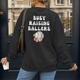 Busy Raising Ballers Baseball Mom Groovy Mother Day Women's Sweatshirt Back Print Busy Raising Ballers Baseball Mom Groovy Mother Day Women's Sweatshirt Back Print