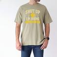 Shut Up I'm Doing Gamechanger Baseball Softball Cheer Men's Comfort Colors T-Shirt Khaki Shut Up I'm Doing Gamechanger Baseball Softball Cheer Men's Comfort Colors T-Shirt Khaki