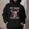 Hit Hard Run Fast Turn Left Baseball Cream Drip Crossed Bats Graphic Youth Hoodie Hit Hard Run Fast Turn Left Baseball Cream Drip Crossed Bats Graphic Youth Hoodie