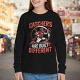 Catchers Are Built Different Baseball Catcher Youth Long Sleeve Tee Catchers Are Built Different Baseball Catcher Youth Long Sleeve Tee