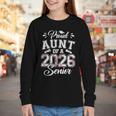 Proud Aunt Of A 2026 Senior Baseball Graduate Youth Long Sleeve Tee Proud Aunt Of A 2026 Senior Baseball Graduate Youth Long Sleeve Tee