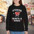 Women's Valentines Day Baseball Stealing Hearts Bases Boys Kids Men Youth Long Sleeve Tee Women's Valentines Day Baseball Stealing Hearts Bases Boys Kids Men Youth Long Sleeve Tee