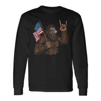 4Th Of July Bigfoot Rock Hand Us Flag Sasquatch Boy Kids Long Sleeve T-Shirt - Thegiftio UK