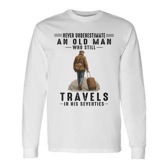 Never Underestimate A Man Who Still Travels In His 70'S Long Sleeve T-Shirt - Thegiftio UK