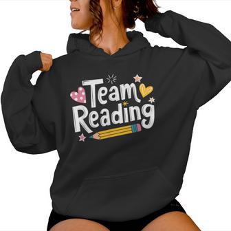 Interventionist Teacher And Literacy Coach Team Reading Women Hoodie - Monsterry