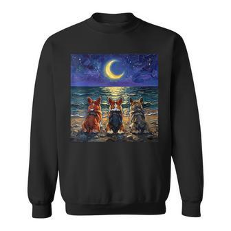 3 コーギーの夜のビーチかわいい犬と三日月のアートワーク スウェットシャツ - Kawaiitshirt