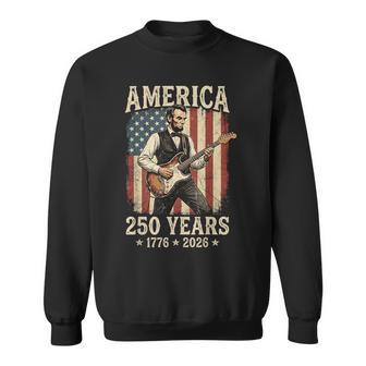 Abraham Lincoln Playing Guitar 4Th July Patriotic 250 Years Sweatshirt - Thegiftio UK