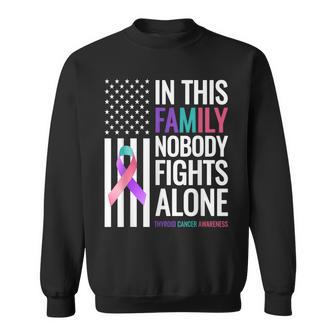 In This Family Nobody Fights Alone Thyroid Cancer Awareness Sweatshirt - Thegiftio UK