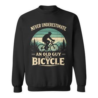 Never Underestimate An Old Guy On A BicycleCycling Bike Men Sweatshirt - Thegiftio