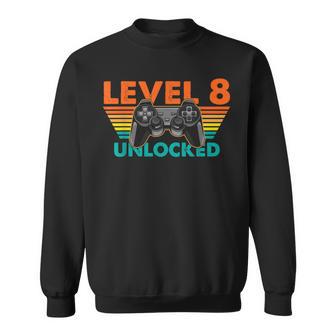 レベル 8 アンロック ゲーマー 誕生日 レトロ コントローラー スウェットシャツ - Kawaiitshirt