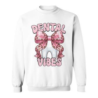 Dentalibes 歯 ピンク ヒョウ柄 弓 歯科医 スウェットシャツ - Kawaiitshirt