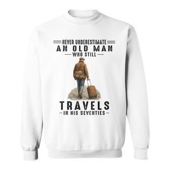 Never Underestimate A Man Who Still Travels In His 70'S Sweatshirt - Thegiftio UK