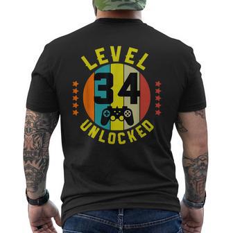 34 Anni Compleanno Regalo Gamer Level 34 Unlocked T-shirt da uomo con stampa posteriore - Novitaregali