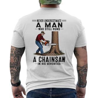 Never Underestimate A Man Who Still Runs Chainsaw In His 70 Men's T-shirt Back Print - Thegiftio UK