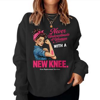 Never Underestimate A Woman With A New Knee Survivor Women Sweatshirt - Thegiftio UK