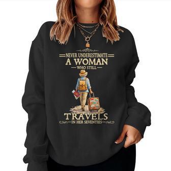 Underestimate A Woman Who Still Travels In Her Seventies Women Sweatshirt - Thegiftio UK