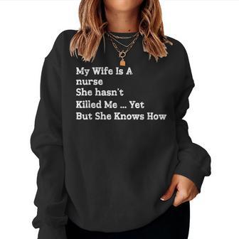 My Wife Is A Nurse She Hasn't Killed Me Yet She Knows How Women Sweatshirt - Monsterry
