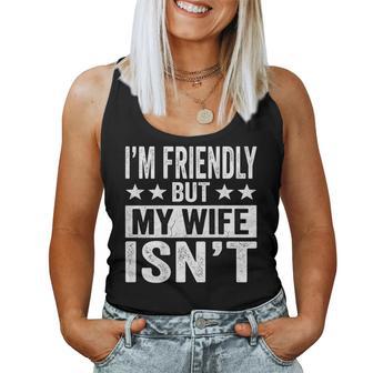 On Back I'm Friendly But My Wife Isn't Husband Humor Women Tank Top - Thegiftio