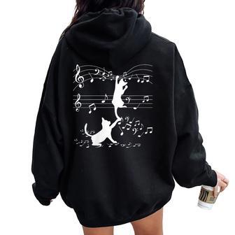Chat Noir Jouant Avec Note De Musique Motif Amoureux Des Chats Sweat à capuche oversize pour femme avec imprimé dans le dos - Cadeauxyz