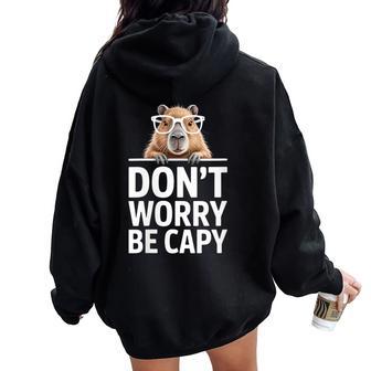 Divertido Capybara Diciendo Don't Worry Be Capy Cute Cuello Women Oversized Hoodie Back Print - Regaloses