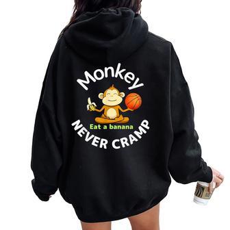 Monkey Never Cramp Eat A Banana Basketball レディース オーバーサイズ パーカー バックプリント - Kawaiitshirt
