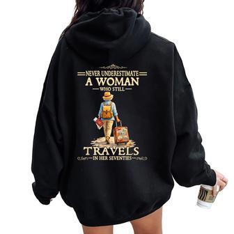 Underestimate A Woman Who Still Travels In Her Seventies Women Oversized Hoodie Back Print - Thegiftio UK