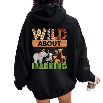 Wild About Learning Teacher Learning Back To School Women Oversized Hoodie Back Print - Thegiftio UK