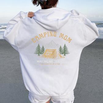 Camping Mom – Making Memories One Campfire At A Time Women Oversized Hoodie Back Print - Thegiftio UK