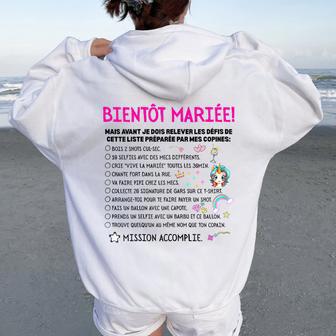 Evjf Liste Jeux Drôle Enterrement Deie De Jeune Fille Sweat à capuche oversize pour femme avec imprimé dans le dos - Cadeauxyz