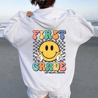 First Grade Dream Team Smile Face First Day Of 1St Grade Women Oversized Hoodie Back Print | Mazezy