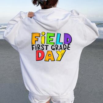 First Grade Field Day Color Teams Field Day Games Women Oversized Hoodie Back Print | Mazezy