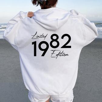 Né En 1982 En 82 Année De Construction Anniversaire Rétro Sweat à capuche oversize pour femme avec imprimé dans le dos - Cadeauxyz