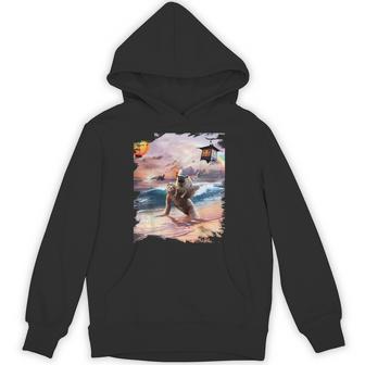 日本海岸でナマケモノに乗るパグ犬 パーカー - Kawaiitshirt