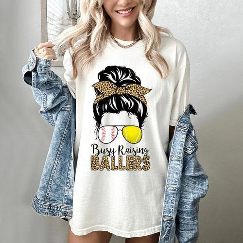 Busy Raising Ballers Tennis Baseball Mom Messy Bun Leopard Women's Comfort Colors T-Shirt - Sportilla