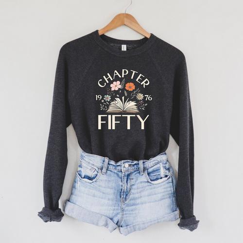 1976 Chapter Fifty 50th Birthday Decorations Wildflower Book Raglan Sleeve Sweatshirt - Bookorys