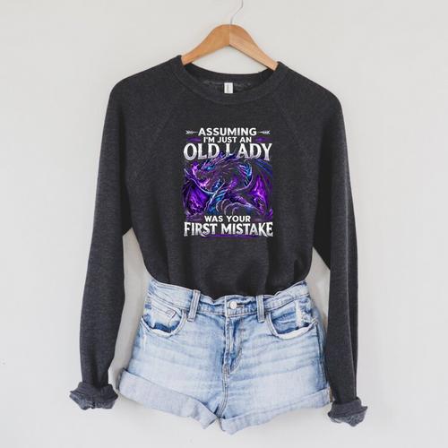 Assuming I'm Just An Old Lady Fantasy Book Reader Mom Dragon Raglan Sleeve Sweatshirt - Bookorys UK