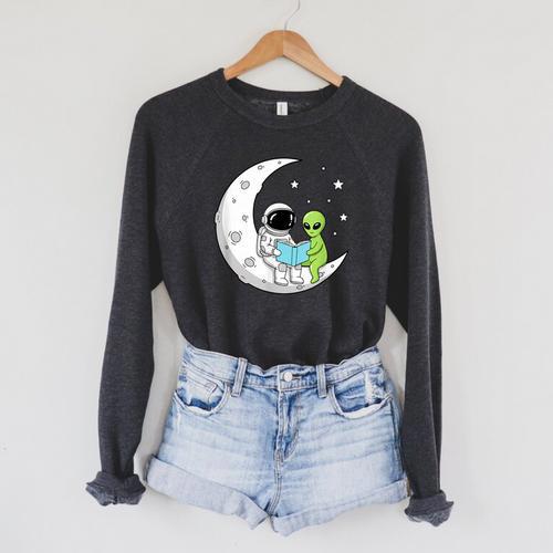 Astronaut And Alien Reading On Moon Space Book Lover Sci Fi Raglan Sleeve Sweatshirt - Bookorys