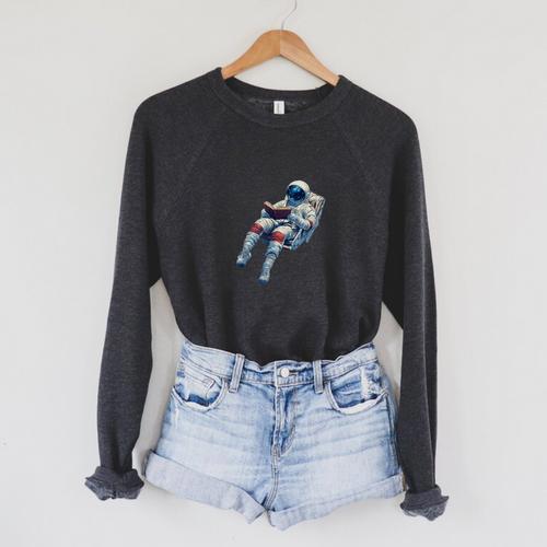 Astronaut Reading Book Sci-Fi Enthusiast Raglan Sleeve Sweatshirt - Bookorys