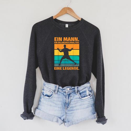 Balance Book Holder Saying Ein Bilanzbuchha Raglan Sleeve Sweatshirt - Bookorys DE